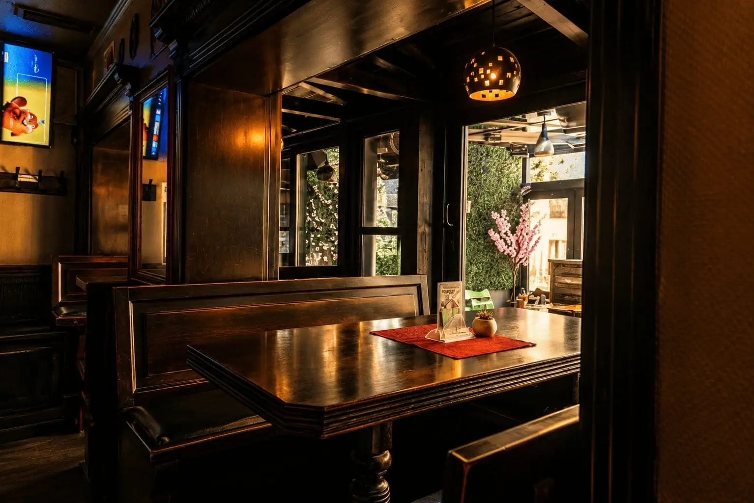 Booth table with beer and candlelight